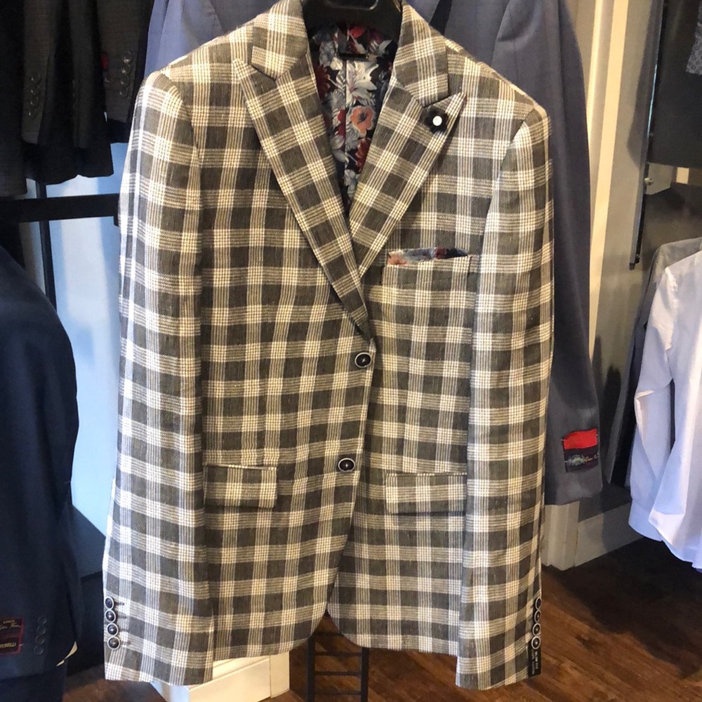Lief Horsens Sport Coat , Black & White check with a floral lining .
